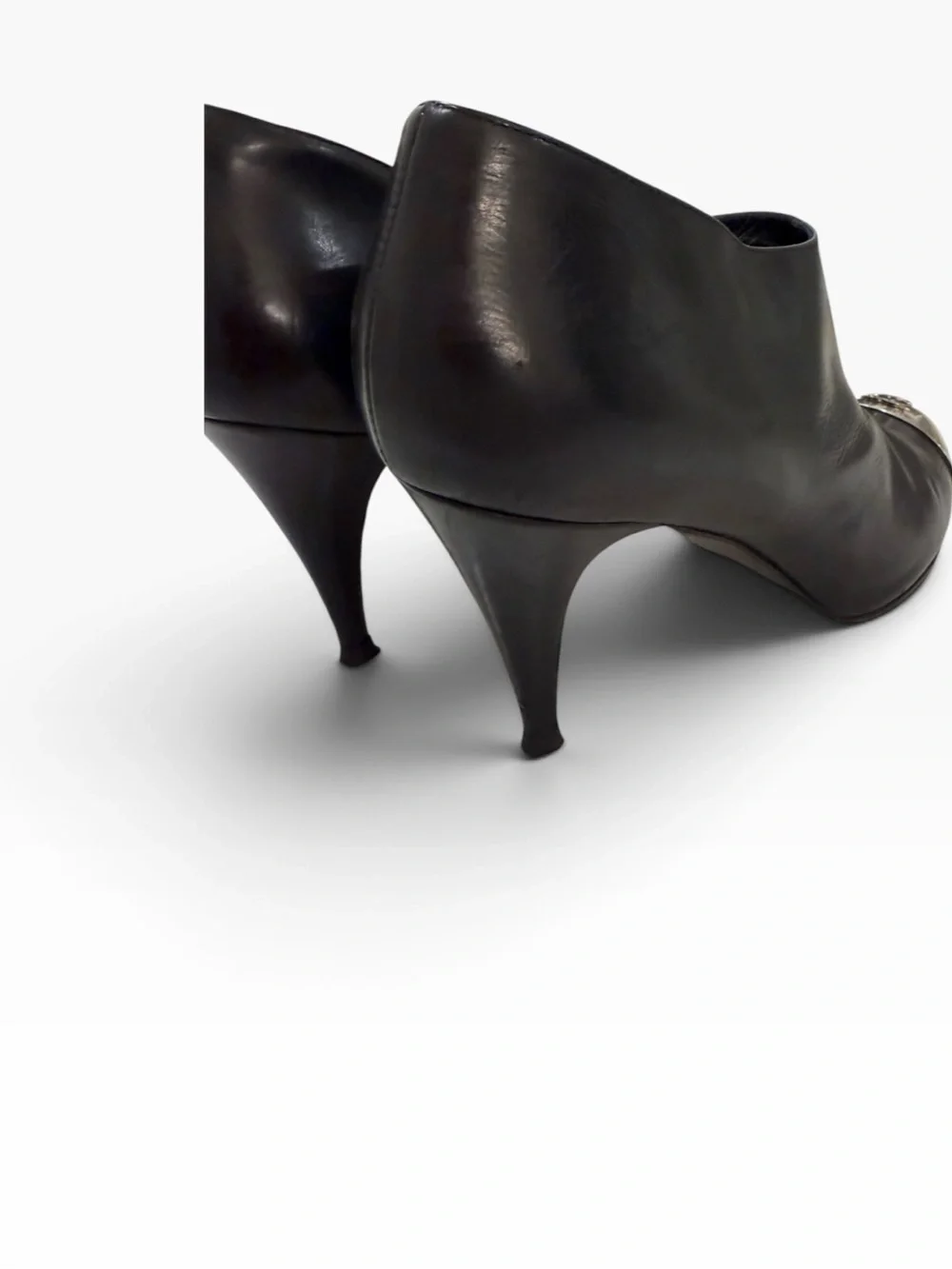 CHANEL Black Leather Ankle Boots with Silver Cap Toe Logo